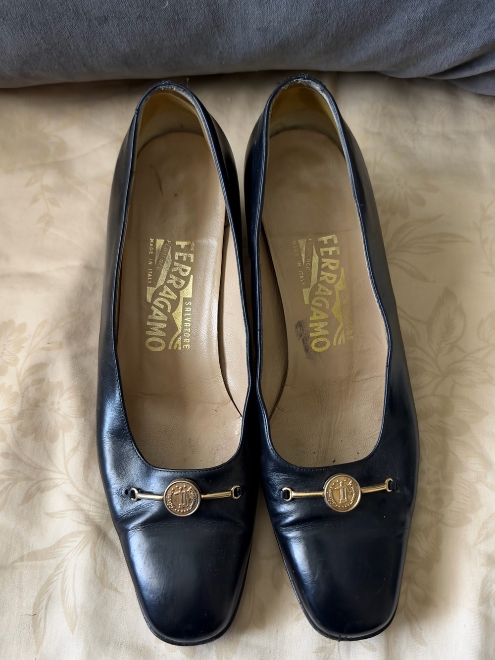 Salvatore Ferragamo Black Leather Mid-Heel Pumps with Gold Medallion